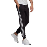 Pantalones Hombre Adidas Essentials Fleece Fitted 3 bandas Algodón - GM1089 - negro - depor8